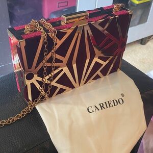 Cariedo Red Velvet Clutch with Gold Geometric Overlay
